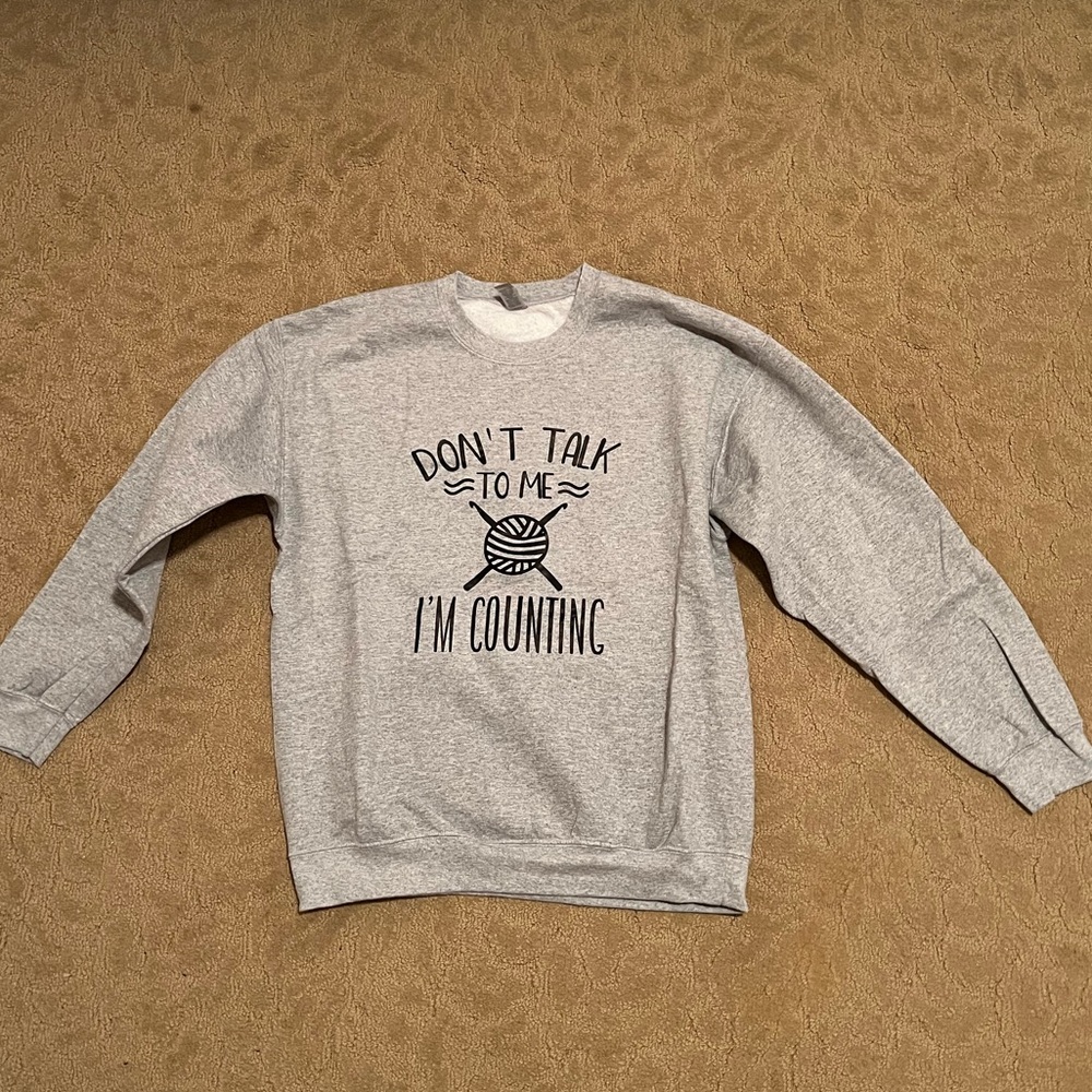 Graphic sweater, size L